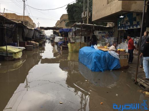 بالصور : الى بلدية الناصرية ، هذه شوارعكم بعد ليلة مطر واحدة