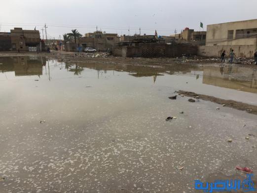 بالصور : الى بلدية الناصرية ، هذه شوارعكم بعد ليلة مطر واحدة