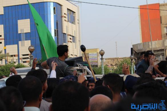 بالصور:المئات يتظاهرون في وسط الناصرية ضد مشروع خصخصة الكهرباء 