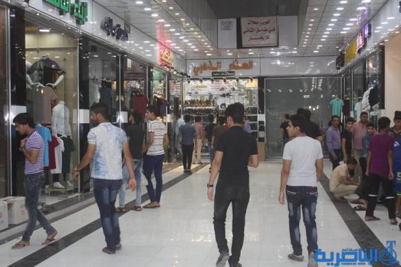 بالصور : اسواق الناصرية لا تنام استعدادا لعيد الفطر المبارك  