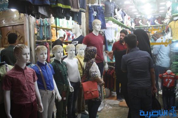بالصور : اسواق الناصرية لا تنام استعدادا لعيد الفطر المبارك  