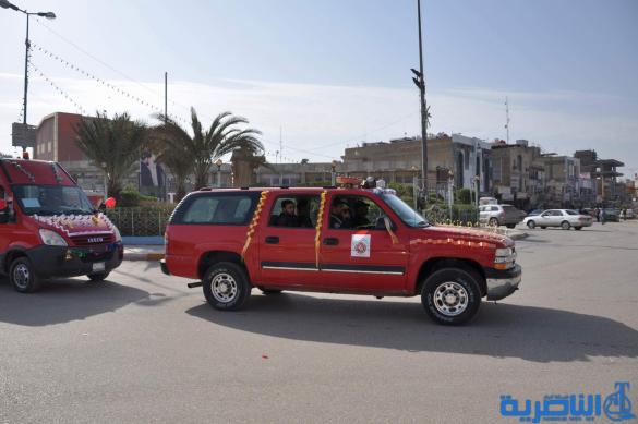 مسيرات الية في ذي قار احتفاء باليوم العالمي للدفاع المدني - تقرير مصور -