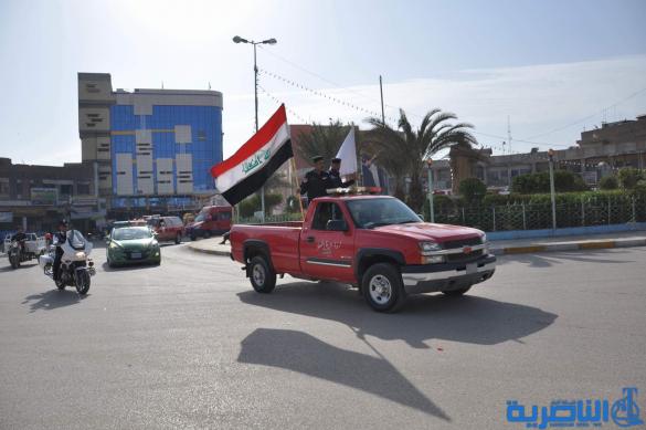 مسيرات الية في ذي قار احتفاء باليوم العالمي للدفاع المدني - تقرير مصور -
