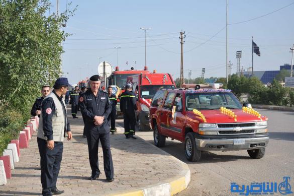مسيرات الية في ذي قار احتفاء باليوم العالمي للدفاع المدني - تقرير مصور -