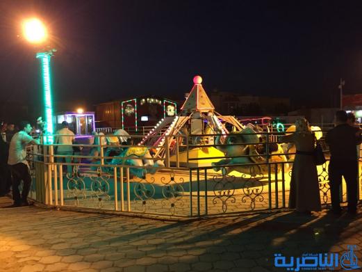 بالصور:فرحة العيد مرتسمة على وجوه العوائل في الناصرية