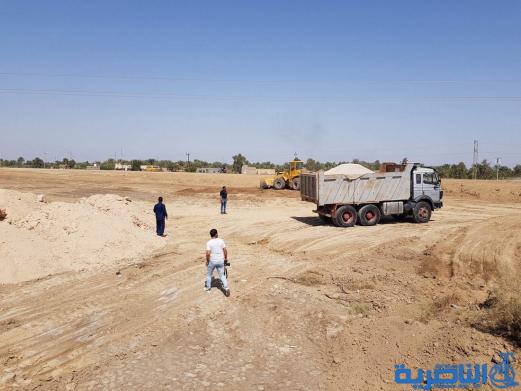محافظ ذي قار يعلن عن مباشرة الدوائر البلدية والطرق بحملة صيانة و تأهيل لطريق جبايش الاصلاح - تقرير مصور -