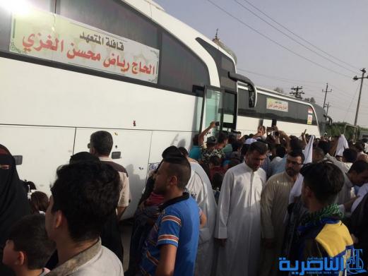 عودة 21 قافلة من حجاج ذي قار بعد اتمام مناسك الحج  - تقرير مصور -