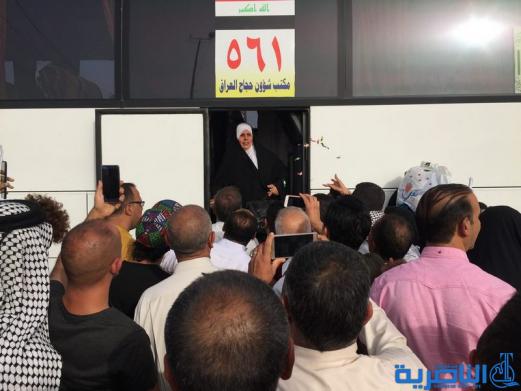 عودة 21 قافلة من حجاج ذي قار بعد اتمام مناسك الحج  - تقرير مصور -