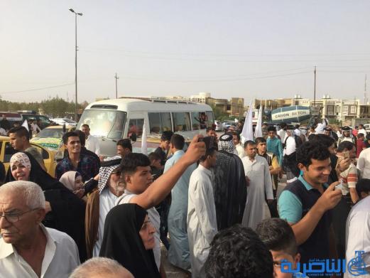 عودة 21 قافلة من حجاج ذي قار بعد اتمام مناسك الحج  - تقرير مصور -