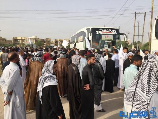 عودة 21 قافلة من حجاج ذي قار بعد اتمام مناسك الحج  - تقرير مصور -