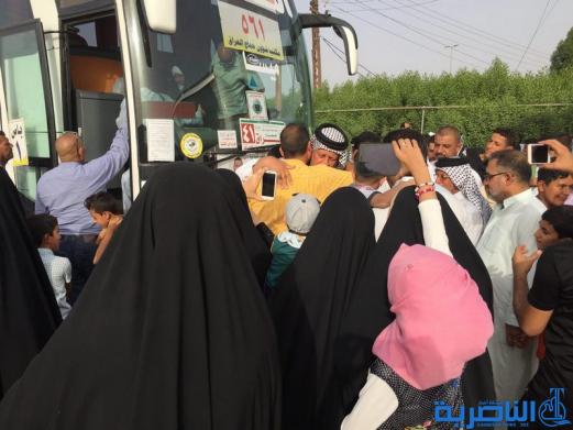 عودة 21 قافلة من حجاج ذي قار بعد اتمام مناسك الحج  - تقرير مصور -