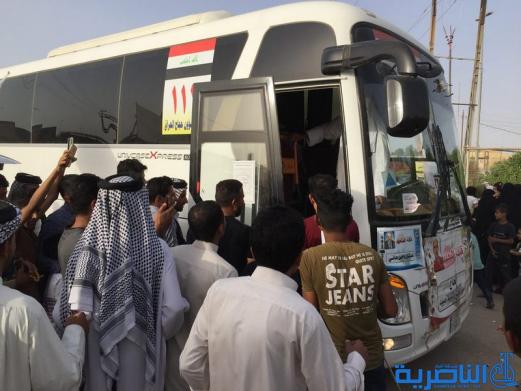 عودة 21 قافلة من حجاج ذي قار بعد اتمام مناسك الحج  - تقرير مصور -