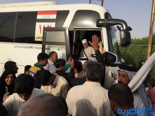 عودة 21 قافلة من حجاج ذي قار بعد اتمام مناسك الحج  - تقرير مصور -