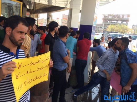 خريجو الناصرية يتظاهرون لمعرفة مصير ستة الاف درجة وظيفية على ملاك التربية - تقرير مصور -