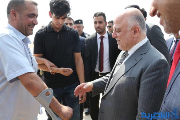 بالصور:وصول رئيس الوزراء حيدر العبادي الى مطار الناصرية الدولي