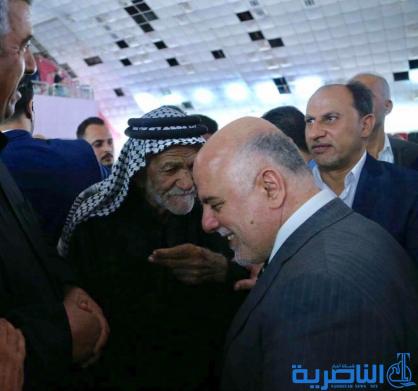 بالصور: شاي وسيلفي ، العبادي متجولا في شوارع الناصرية