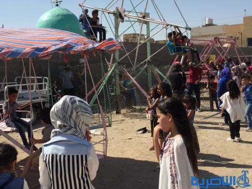 بالصور:اطفال الناصرية في اول ايام عيد الاضحى المبارك
