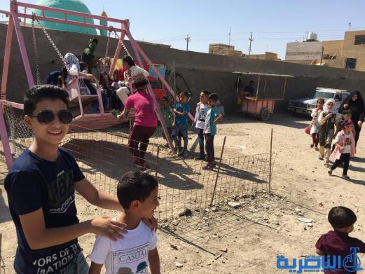 بالصور:اطفال الناصرية في اول ايام عيد الاضحى المبارك