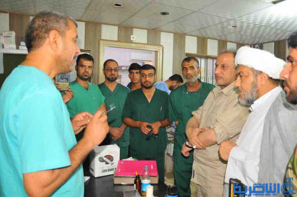 بالصور : وفد ذي قار يزور موقع سبايكر ويواصل لقاءاته مع مقاتلي الحشد الشعبي والقوى الامنية في تكريت