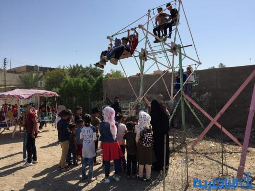بالصور:اطفال الناصرية في اول ايام عيد الاضحى المبارك
