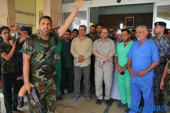 بالصور : وفد ذي قار يزور موقع سبايكر ويواصل لقاءاته مع مقاتلي الحشد الشعبي والقوى الامنية في تكريت
