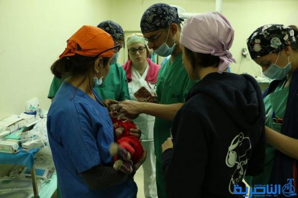 فريق طبي ايطالي يباشر باجراء مائة عملية جراحية تجميلية في الناصرية - تقرير مصور -