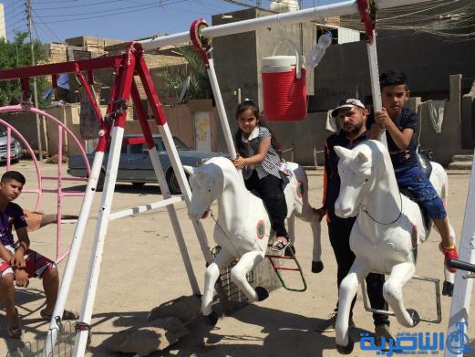 بالصور:اطفال الناصرية في اول ايام عيد الاضحى المبارك