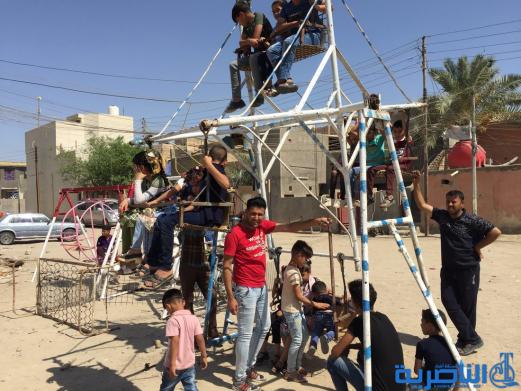 بالصور:اطفال الناصرية في اول ايام عيد الاضحى المبارك