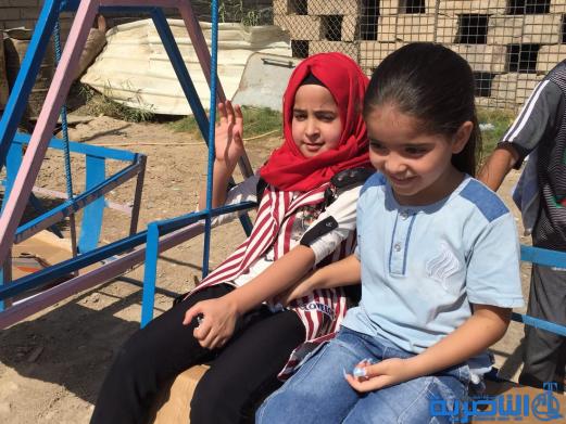 بالصور:اطفال الناصرية في اول ايام عيد الاضحى المبارك