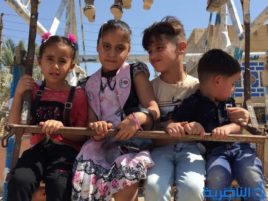بالصور:اطفال الناصرية في اول ايام عيد الاضحى المبارك