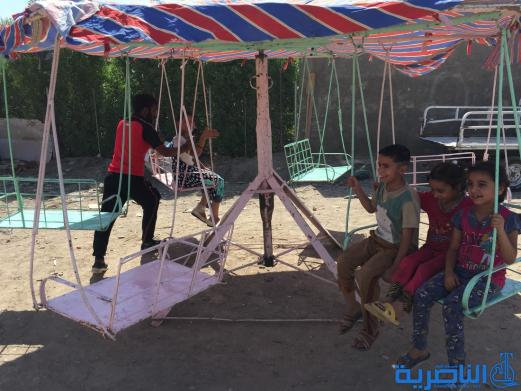 بالصور:اطفال الناصرية في اول ايام عيد الاضحى المبارك