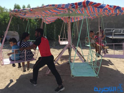بالصور:اطفال الناصرية في اول ايام عيد الاضحى المبارك