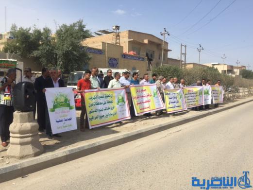 العشرات يتظاهرون في الناصرية للمطالبة بتخفيض اجور الكهرباء - تقرير مصور -