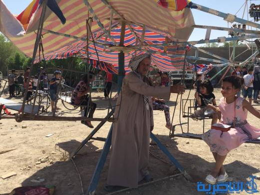 بالصور:اطفال الناصرية في اول ايام عيد الاضحى المبارك