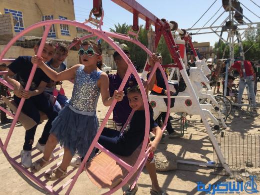 بالصور:اطفال الناصرية في اول ايام عيد الاضحى المبارك