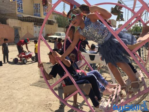 بالصور:اطفال الناصرية في اول ايام عيد الاضحى المبارك