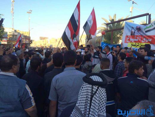 بالصور : متظاهرو الناصرية يدعون الامم المتحدة للوقوف مع العراق في حربه ضد الارهاب
