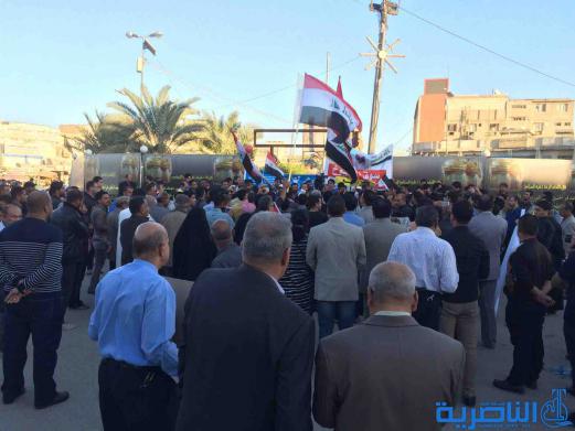 بالصور : متظاهرو الناصرية يدعون الامم المتحدة للوقوف مع العراق في حربه ضد الارهاب