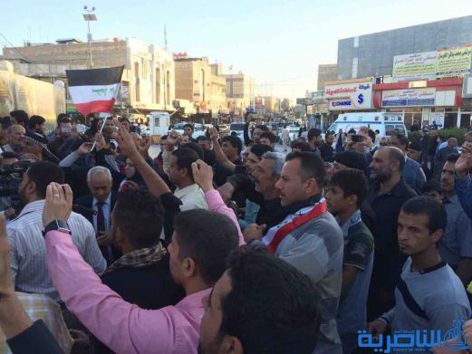 بالصور : متظاهرو الناصرية يدعون الامم المتحدة للوقوف مع العراق في حربه ضد الارهاب