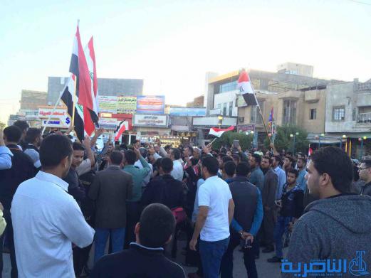 بالصور : متظاهرو الناصرية يدعون الامم المتحدة للوقوف مع العراق في حربه ضد الارهاب