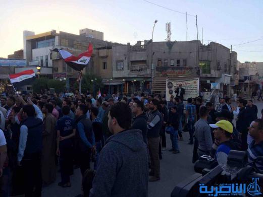 بالصور : متظاهرو الناصرية يدعون الامم المتحدة للوقوف مع العراق في حربه ضد الارهاب