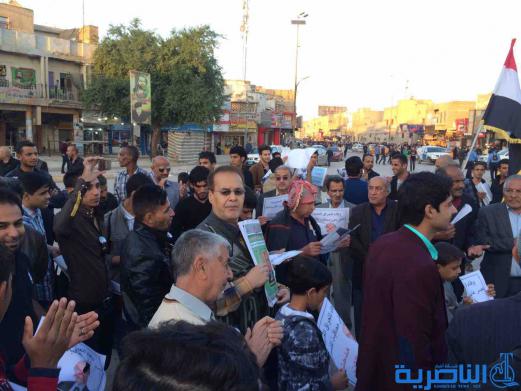 بالصور : متظاهرو الناصرية يطالبون العبادي بالاعتذار ويؤكدون استمرار التظاهرات السلمية