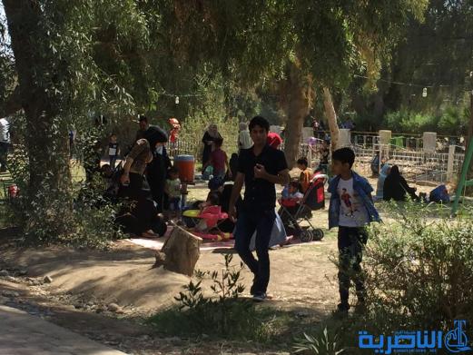 بالصور:مئات العوائل في الناصرية تحتفل بعيد النوروز