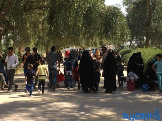 بالصور:مئات العوائل في الناصرية تحتفل بعيد النوروز