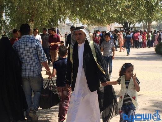 بالصور:مئات العوائل في الناصرية تحتفل بعيد النوروز