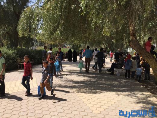 بالصور:مئات العوائل في الناصرية تحتفل بعيد النوروز