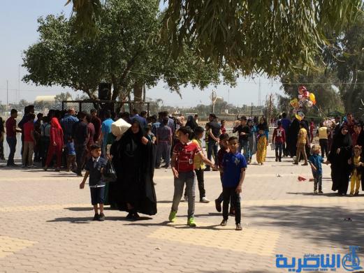 بالصور:مئات العوائل في الناصرية تحتفل بعيد النوروز