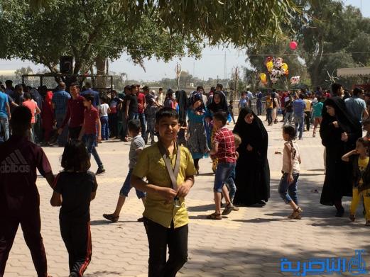 بالصور:مئات العوائل في الناصرية تحتفل بعيد النوروز
