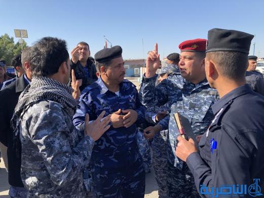 موظفو العقود في حماية الانابيب النفطية يتظاهرون في الناصرية لتثبيتهم على الملاك الدائم - تقرير مصور -