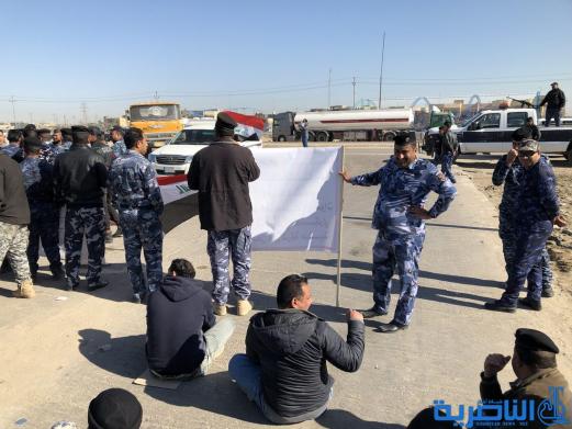 موظفو العقود في حماية الانابيب النفطية يتظاهرون في الناصرية لتثبيتهم على الملاك الدائم - تقرير مصور -